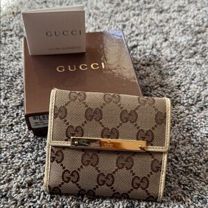 Authentic Gucci Beige and Brown Monogram Wallet